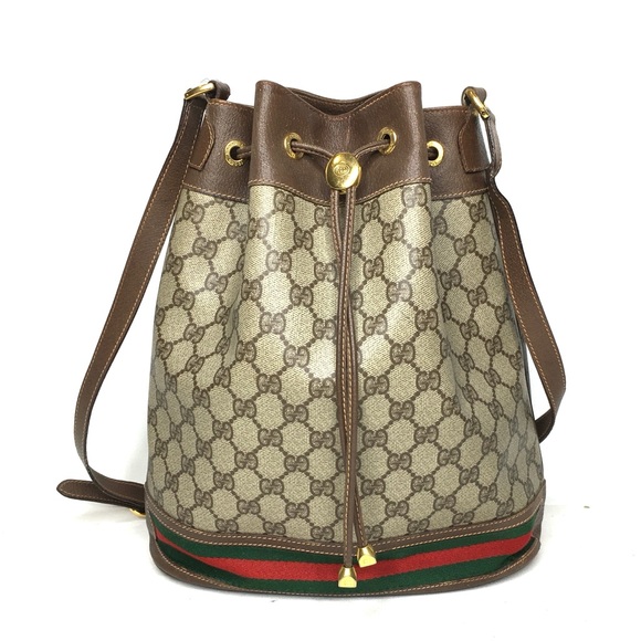 Gucci Handbags - Authentic Gucci brown monogram coated canvas bucket bag